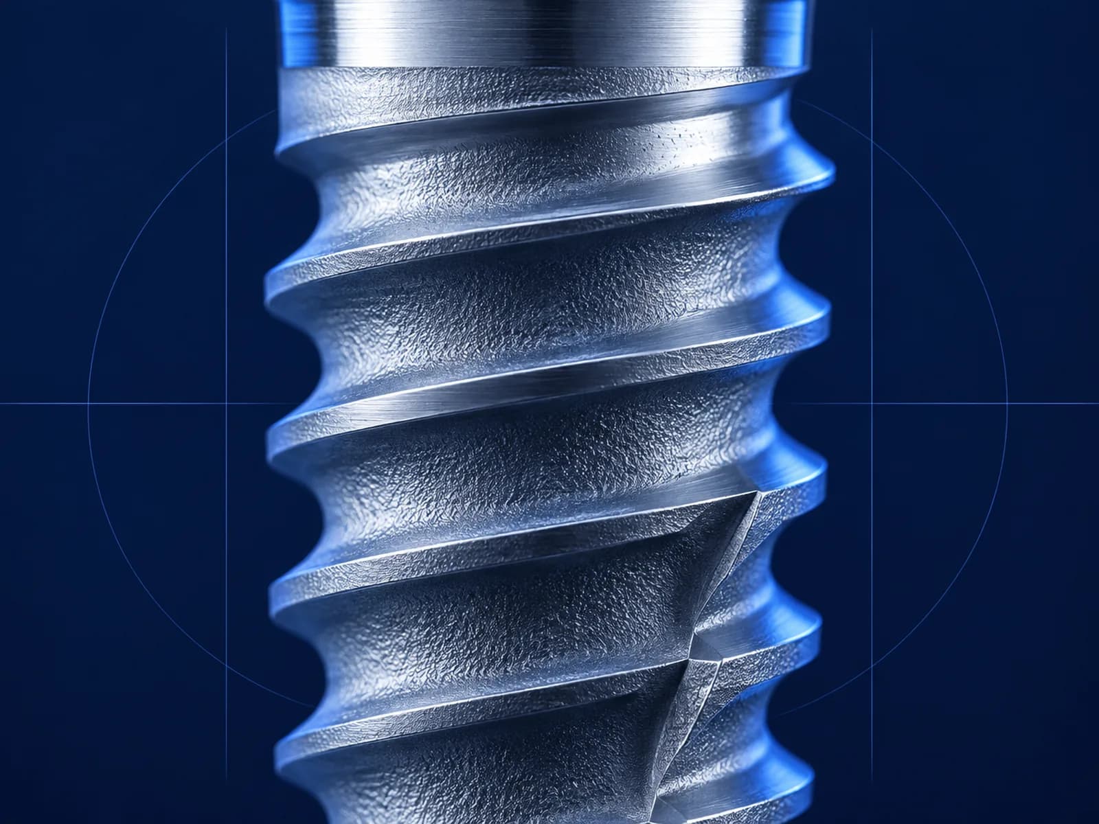 Macro sur le filetage d'un implant dentaire en titane
